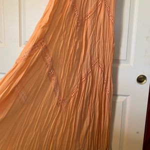 Long peach dress by Chelsea and Violet